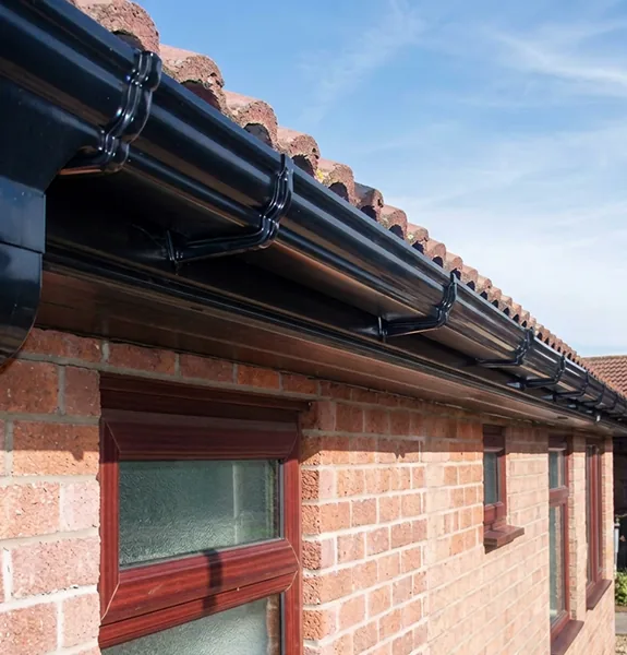 New white uPVC guttering and fascias fitted on a Guildford home
